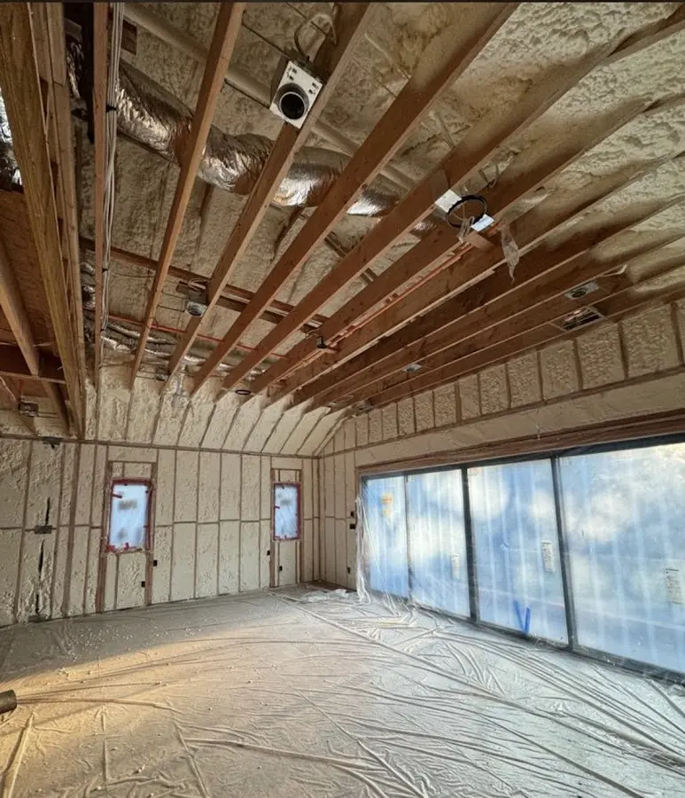 Interior walls and ceiling insulated with spray foam during new construction in Crest Hill
